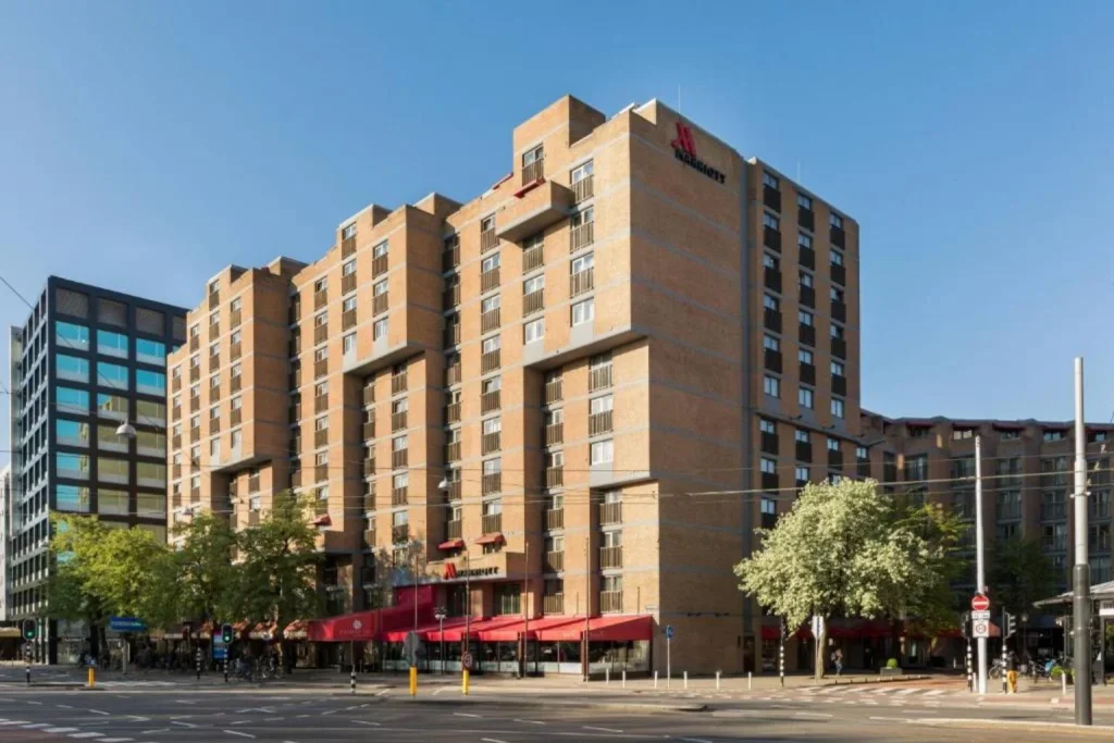 Street view of the Amsterdam Marriott Hotel building in Amsterdam, Netherlands.