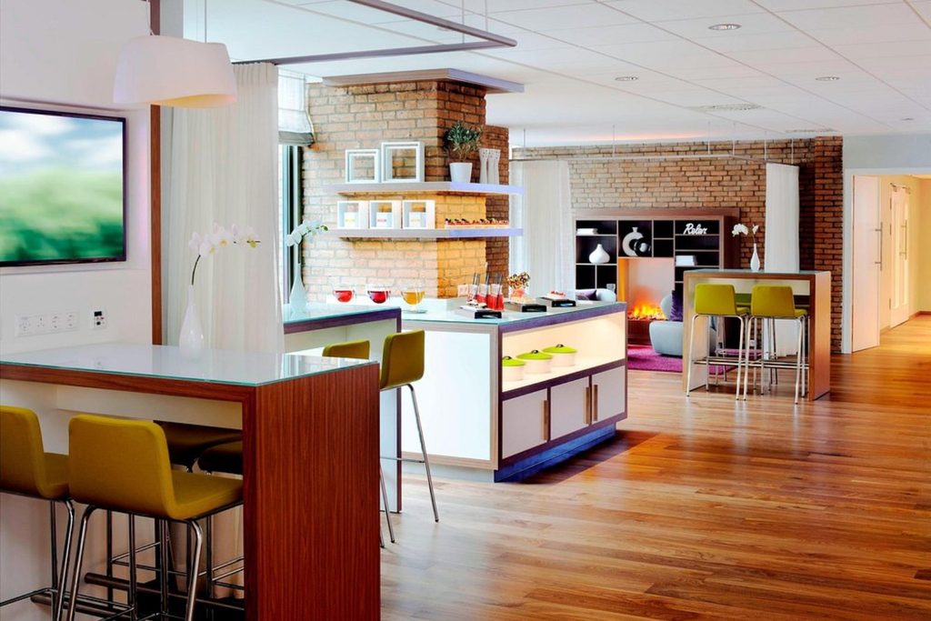 Contemporary lounge interior at Amsterdam Marriott Hotel with modern seating and warm wood finishes