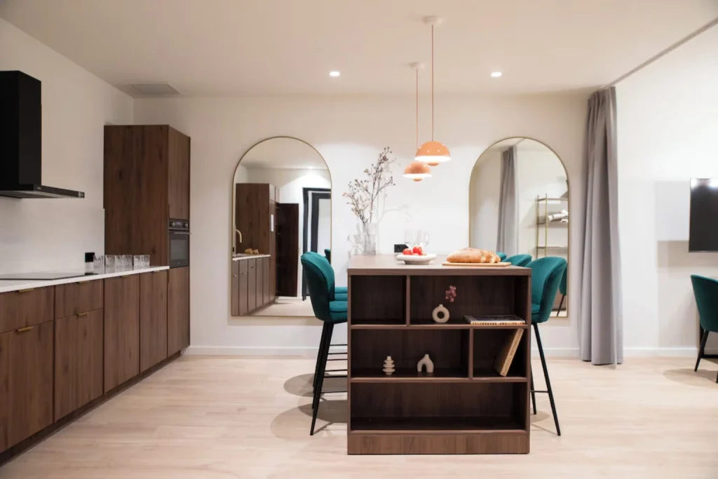 Contemporary apartment interior at Bob W Oosterpark Amsterdam with a fully equipped kitchen, dining island and modern furnishings