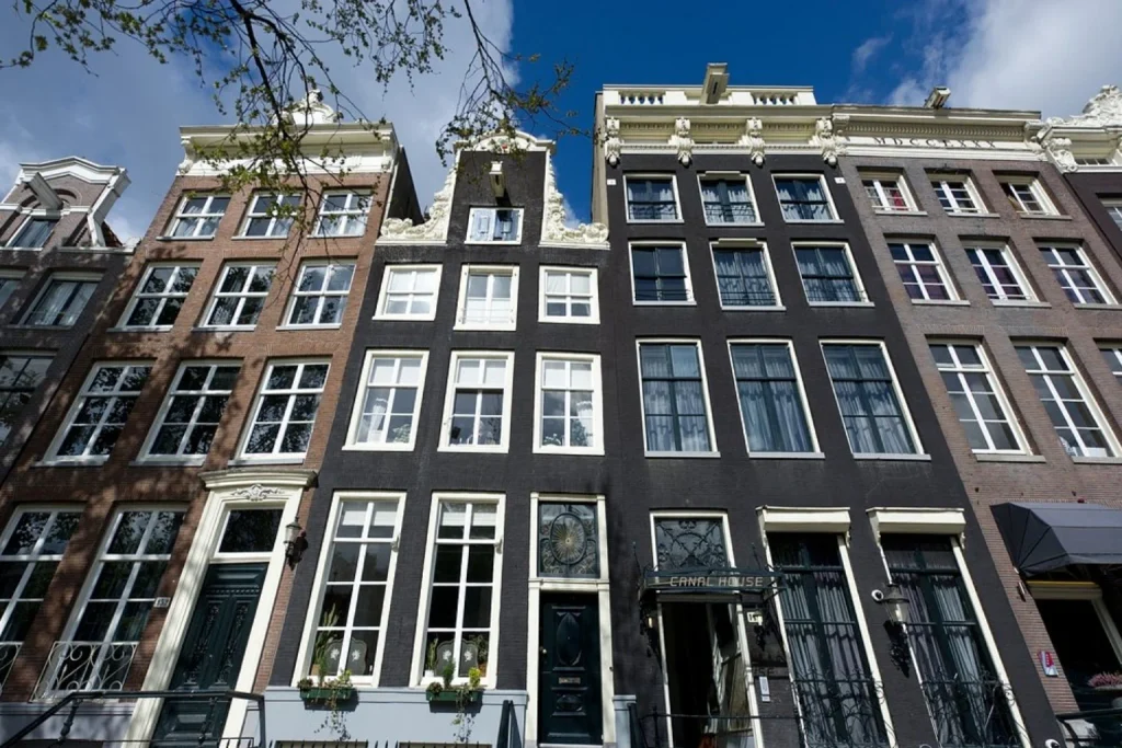 Traditional narrow canal houses with elegant historic façades and classic Dutch architecture, Canal House, Amsterdam.