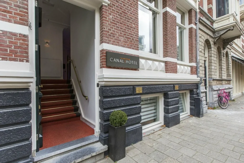 Street entrance to Central Canal Business Hotel in Amsterdam