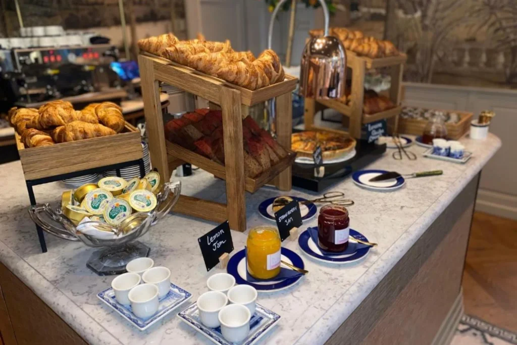 Breakfast buffet featuring fresh croissants, bread, jams and other morning selections at Hotel 717, Amsterdam.