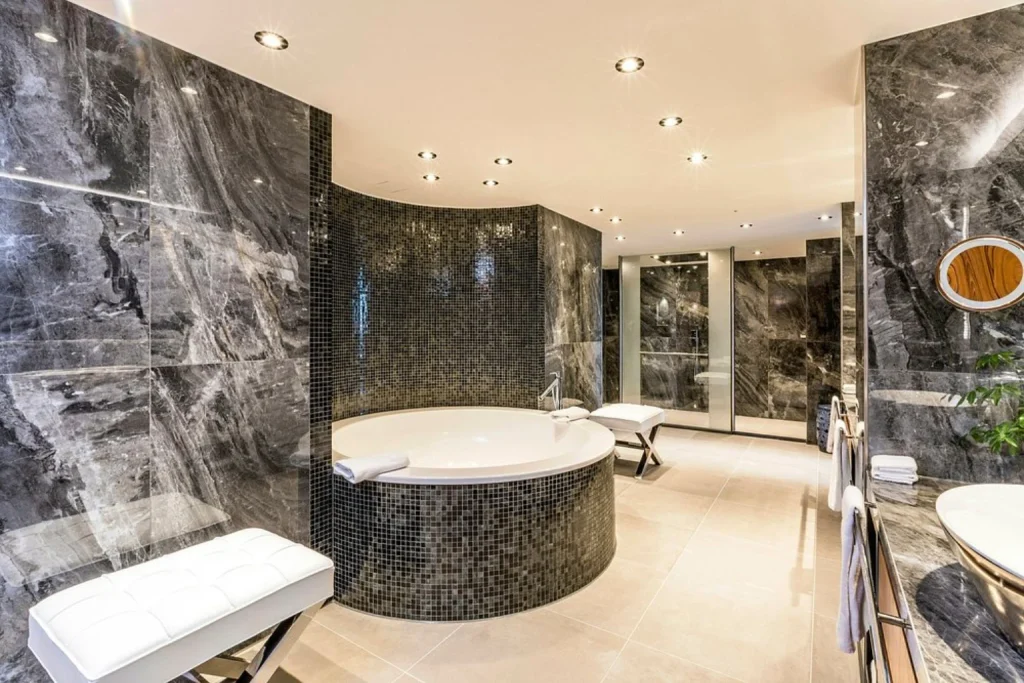 Luxury marble bathroom with large whirlpool in the Presidential Suite at Hotel Okura Amsterdam