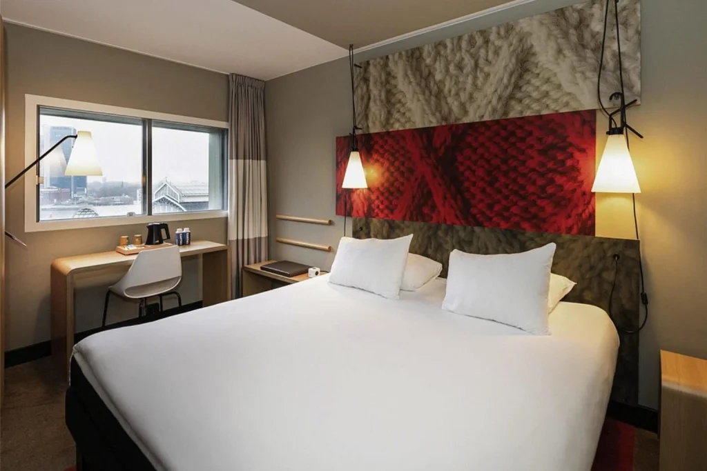 Modern double room with city view at Ibis Amsterdam Centre