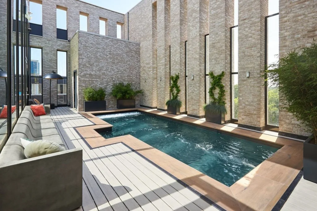 Relaxing indoor pool surrounded by natural light and greenery, Van der Valk Hotel Amsterdam