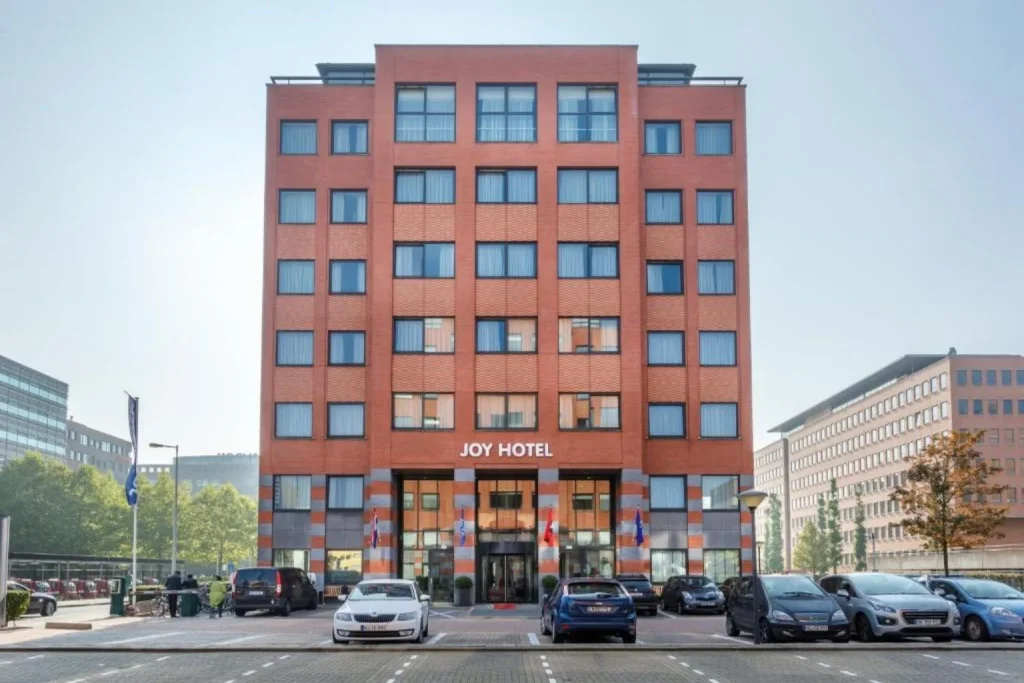 Exterior view of Joy Hotel in Amsterdam with its red brick facade and main entrance
