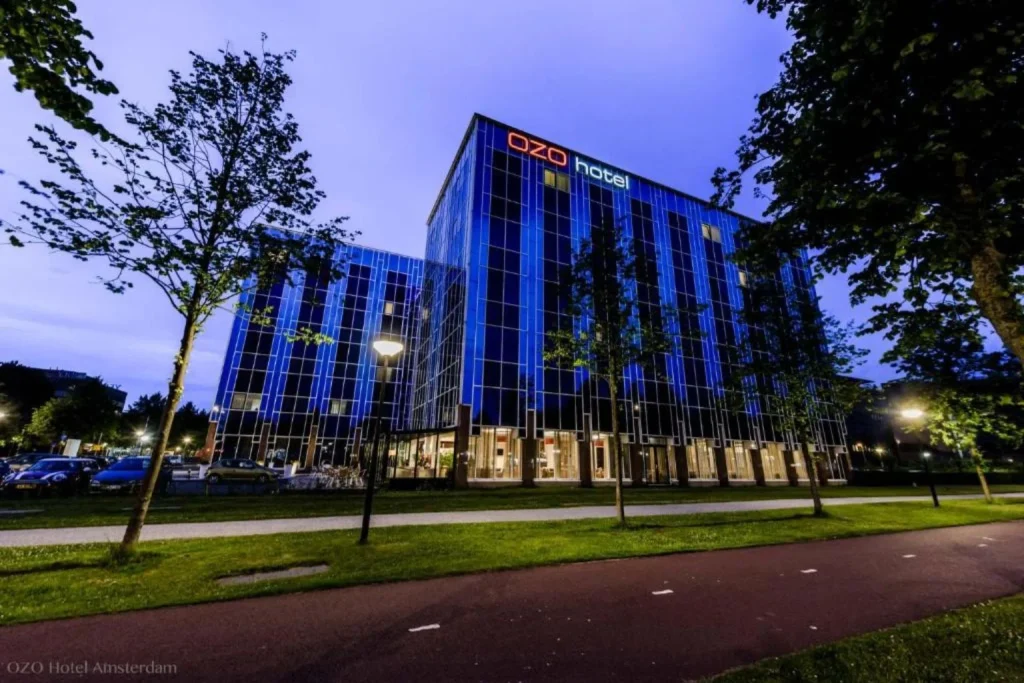 Blue glass hotel exterior at OZO Hotels Arena Amsterdam