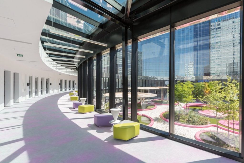Meeting Academy Gallery. Bright glass corridor overlooking the landscaped courtyard at Park Inn by Radisson Amsterdam City West