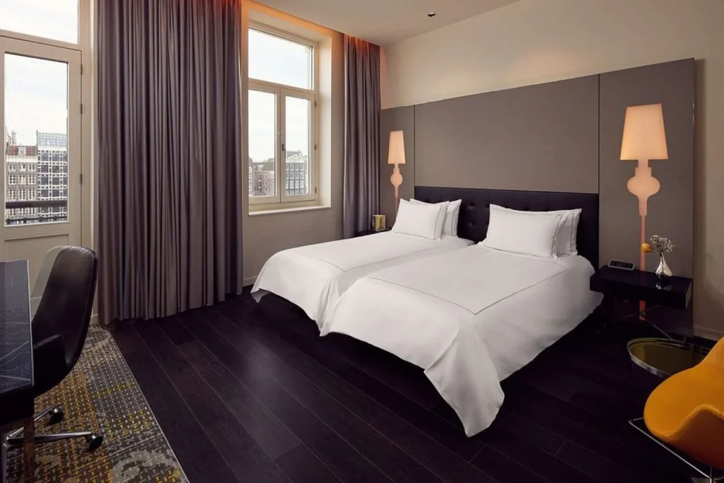 Twin guest room at Park Plaza Victoria Amsterdam in Amsterdam, Netherlands.