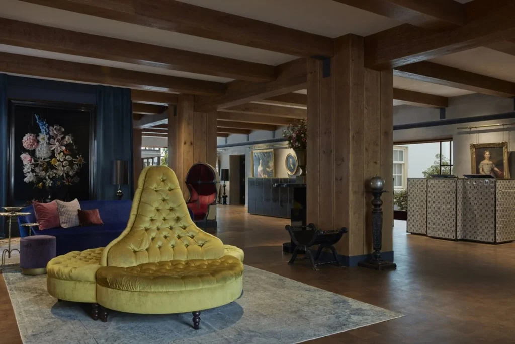 Elegant lobby combining historic character with distinctive contemporary furnishings at Pulitzer Amsterdam.