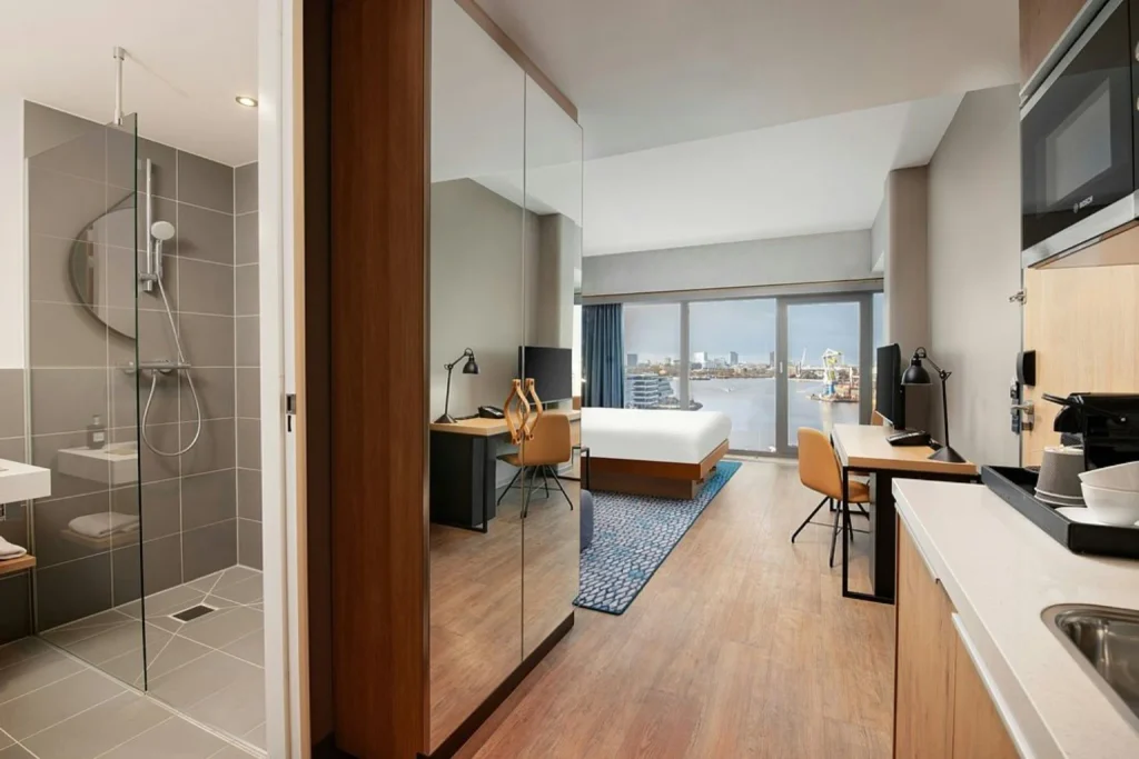 Modern studio suite with kitchenette, bathroom and harbour view at Residence Inn by Marriott Amsterdam Houthavens, Amsterdam