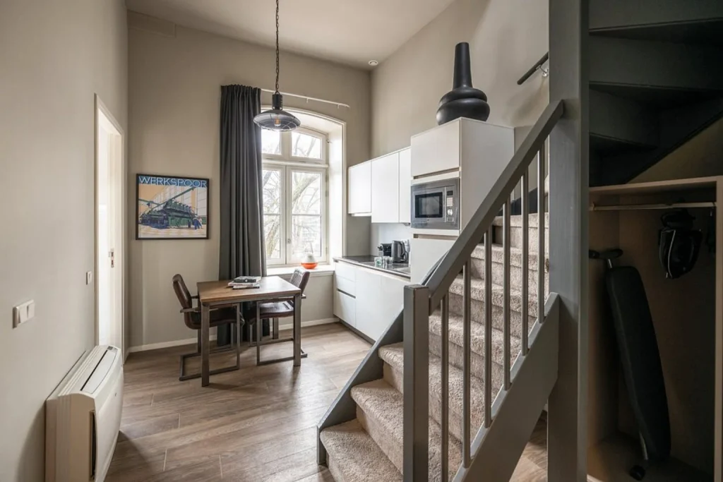 Apartment kitchen and dining area at YAYS Amsterdam Maritime