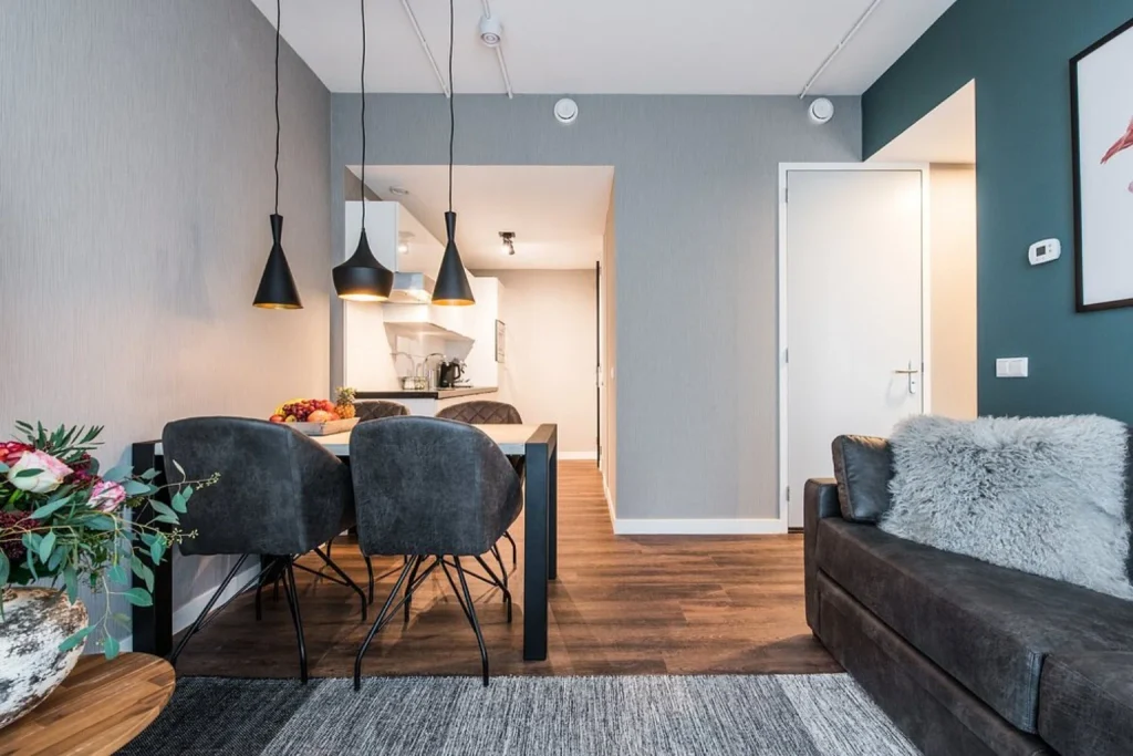 Modern apartment living and dining area at YAYS Amsterdam-Noord
