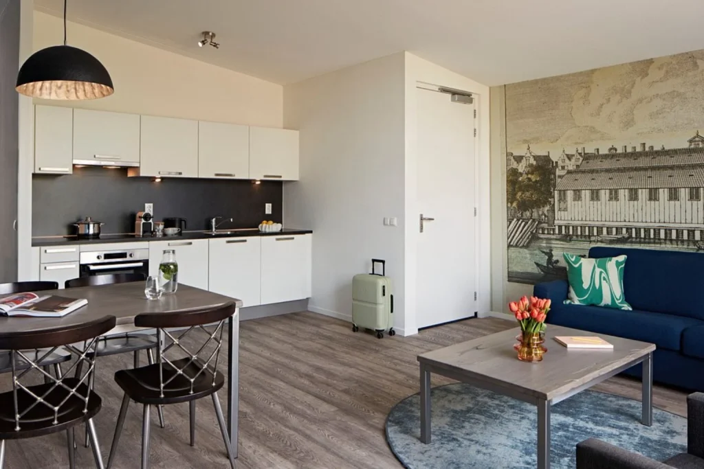 Spacious apartment at YAYS Amsterdam Prince Island featuring a fully equipped kitchen, dining area and comfortable living space