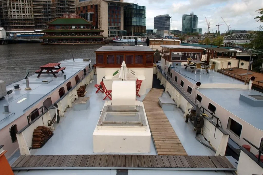Amsterdam Love Houseboat with outdoor deck and surrounding houseboats