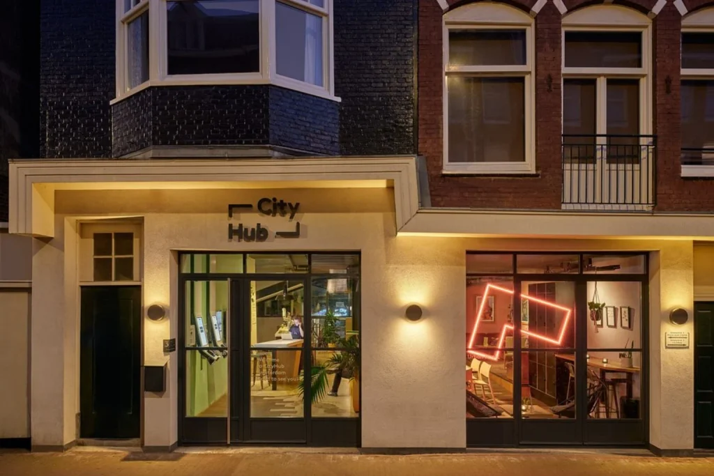 Stylish street-level entrance with modern lighting and contemporary interiors at CityHub Amsterdam, Amsterdam
