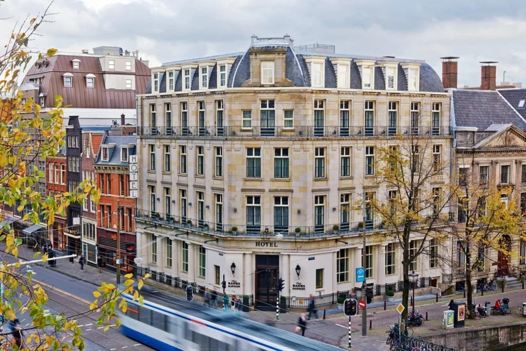 Elegant historic corner building overlooking an Amsterdam canal and city street, Banks Mansion Hotel Amsterdam