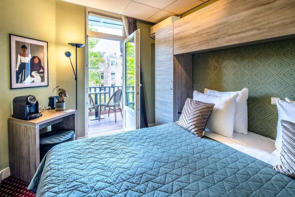 Guest room at Hotel Atlantis Amsterdam with a private balcony