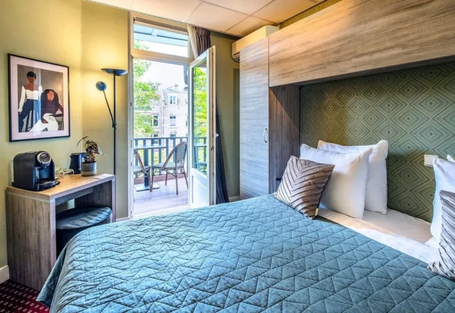 Guest room at Hotel Atlantis Amsterdam with a private balcony