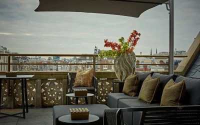 Luxury rooftop terrace with comfortable lounge seating and panoramic city views at Hotel Twenty Seven, Amsterdam