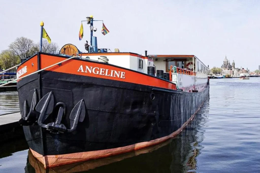Hotelboat Angeline moored on the waterfront in Amsterdam