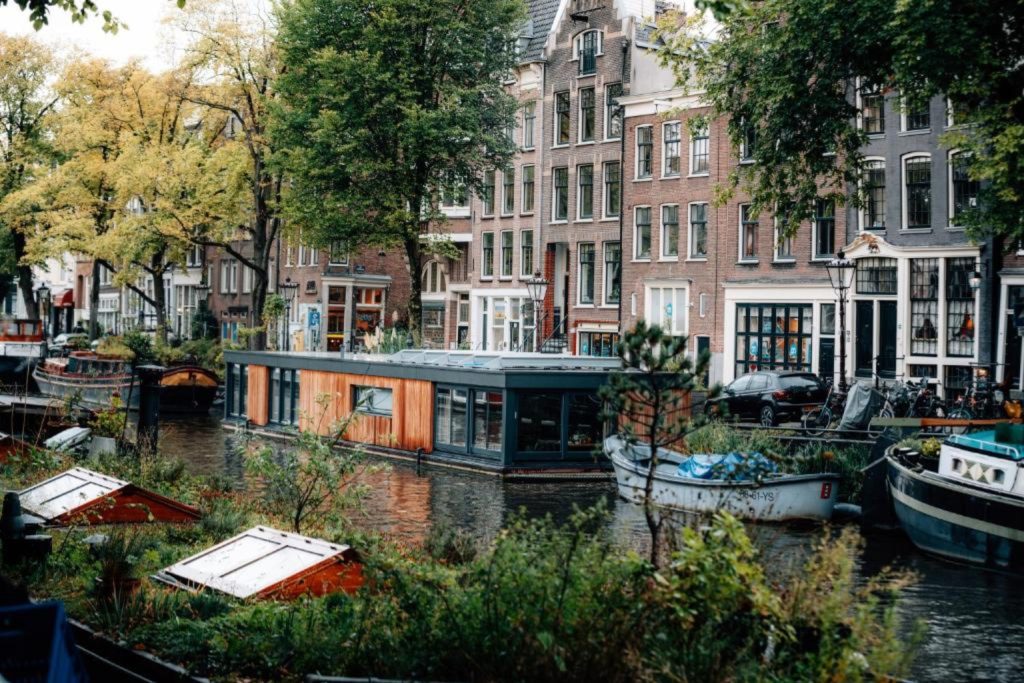 Houseboat Suites Amsterdam on the Prinsengracht canal surrounded by historic canal houses
