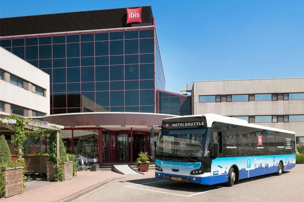 Airport hotel entrance with convenient shuttle bus service to Schiphol Airport at Ibis Schiphol Amsterdam Airport in Amsterdam.