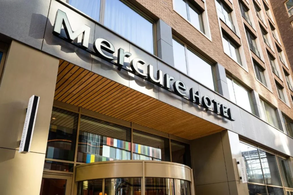Modern entrance and exterior of Mercure Amsterdam North Station hotel