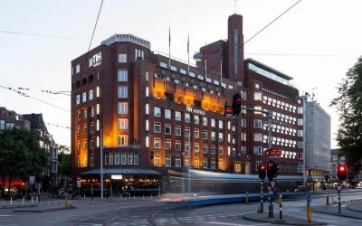 Historic brick hotel exterior near tram lines and Leidseplein at NH Amsterdam Leidseplein, Amsterdam, Netherlands