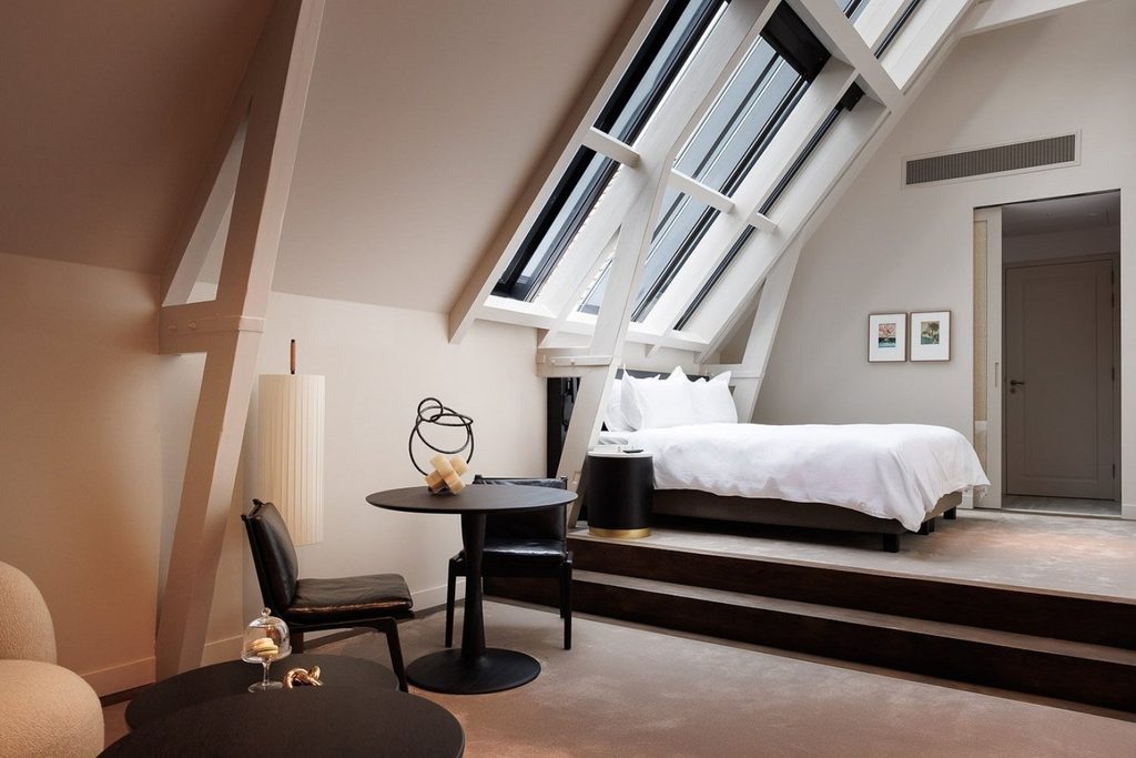Luxury loft-style hotel room with skylights, king-size bed and contemporary design at Pillows Grand Boutique Hotel Maurits at the Park in Amsterdam
