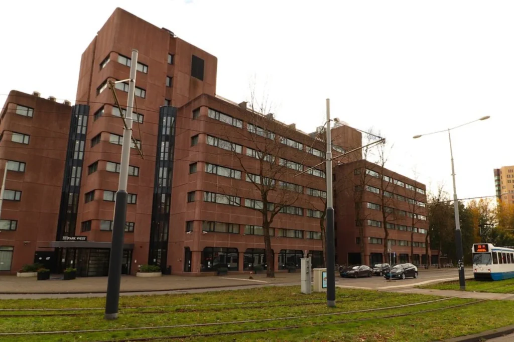 Contemporary hotel building with convenient tram access near the entrance at XO Hotels Park West, Amsterdam